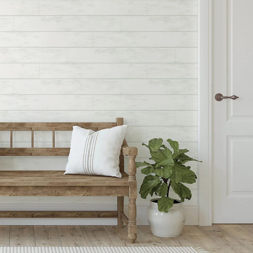 peel and stick wood wallpaper in light wash