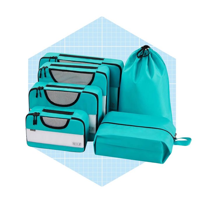 Five storage bags and one drawstring bag are displayed together, showcasing a vibrant turquoise color against a light blue grid background.