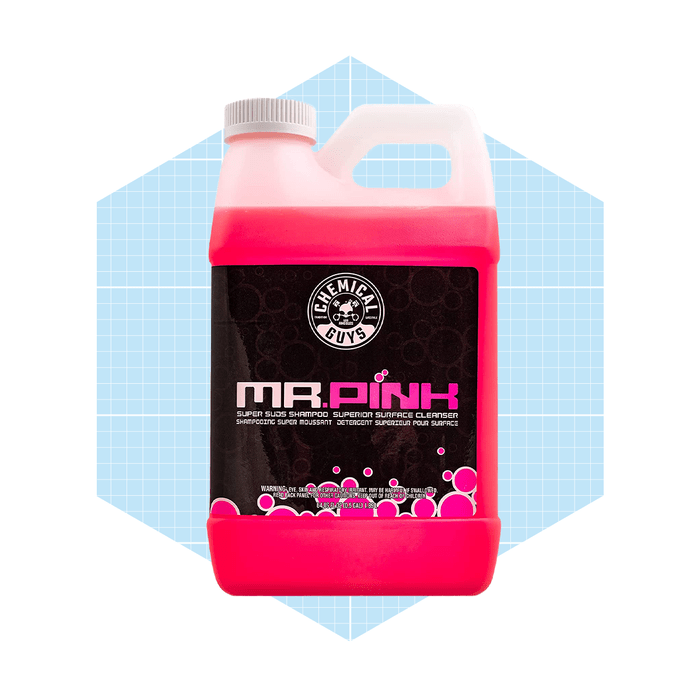 A pink liquid detergent bottle labeled 