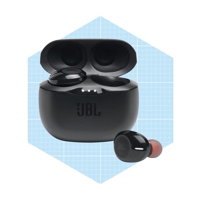A pair of black wireless earbuds is displayed, with one earbud resting outside its charging case, which is open against a blue grid background.