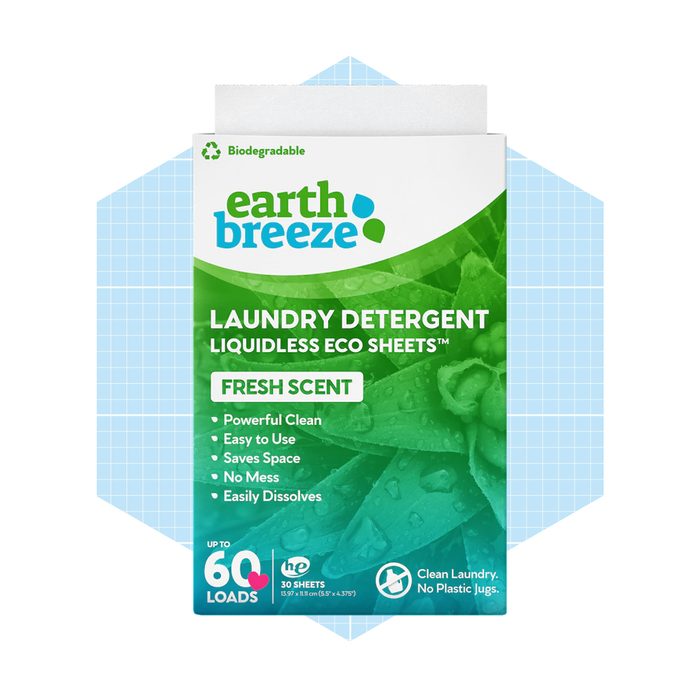 A laundry detergent package displays eco-friendly liquidless sheets, promoting a fresh scent. It features text highlighting powerful cleaning and ease of use.