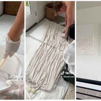 A person mixes white material in a bucket, while another shapes it onto canvas, creating textured abstract art in a well-lit room.