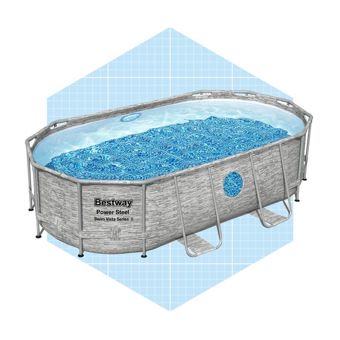A gray, oval pool filled with blue water sits on a blue grid background, featuring a patterned exterior and a visible ladder for access.