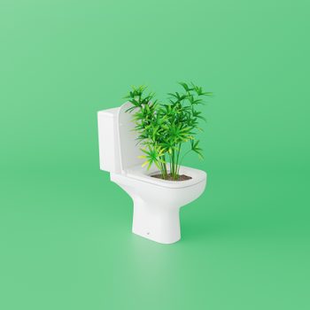 A white toilet holds green plants growing in soil, set against a vibrant green background, blending unconventional decor with nature.