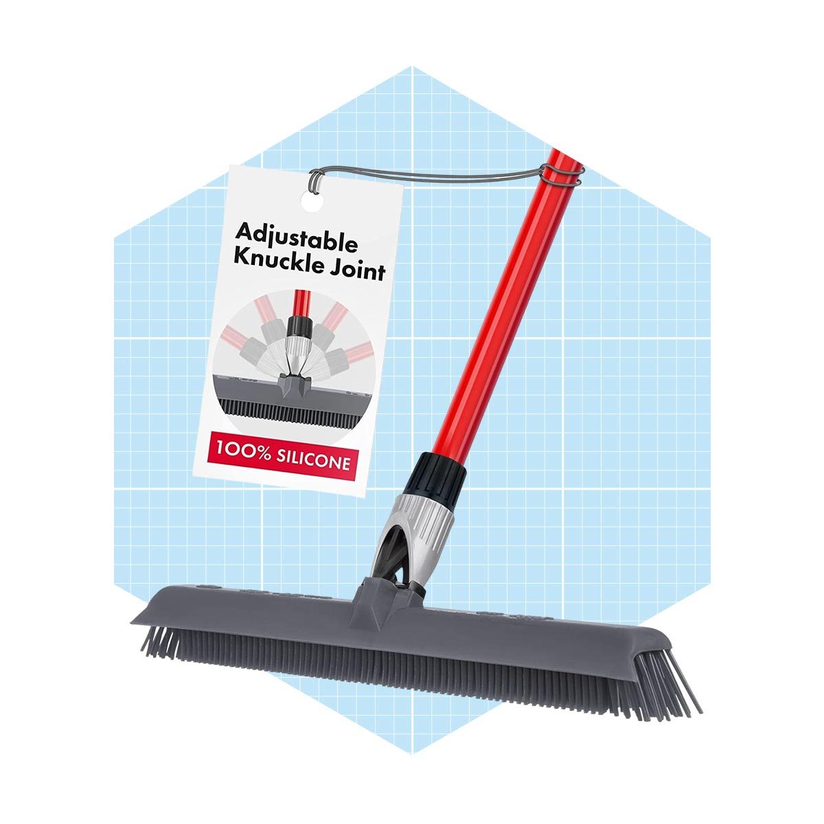 A silicone broom leans against a light blue grid backdrop, featuring a red handle and a hangtag highlighting its adjustable knuckle joint design.
