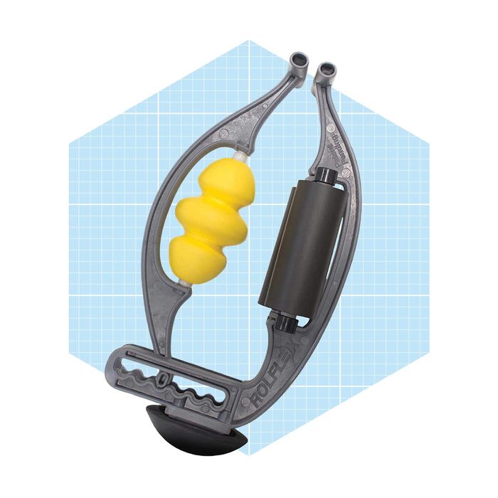 A ergonomic massager features a yellow textured roller, positioned within a gray frame, designed to relieve muscle tension against a light blue grid background.