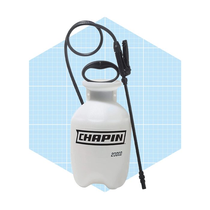 A white sprayer labeled 
