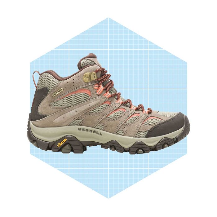 A hiking shoe is displayed, featuring a waterproof design, vibrant laces, and textured sole, set against a light blue geometric background.