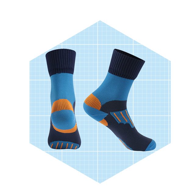 Two colorful socks are displayed, showcasing a blue and orange design, against a light blue grid background. They are positioned at angles to highlight their features.