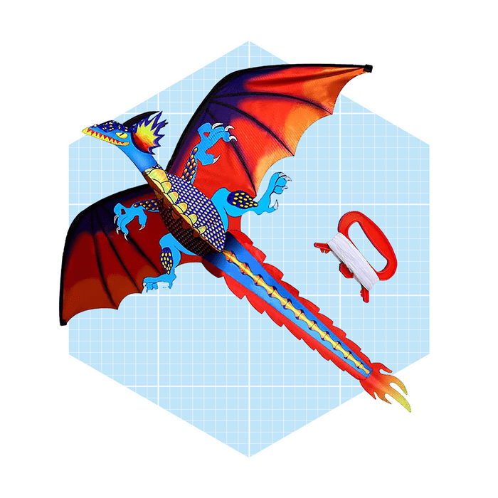 A vibrant dragon kite sits on a blue grid background, accompanied by a spool and handle for flying, showcasing colorful designs and a fiery tail.