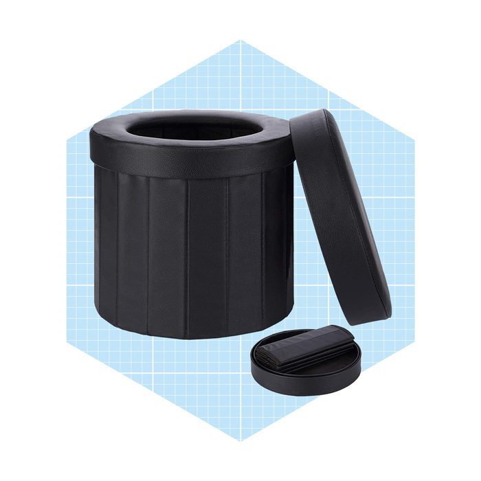 A black cylindrical storage ottoman with a removable lid and a smaller, flat accessory nearby, set against a light blue grid background.
