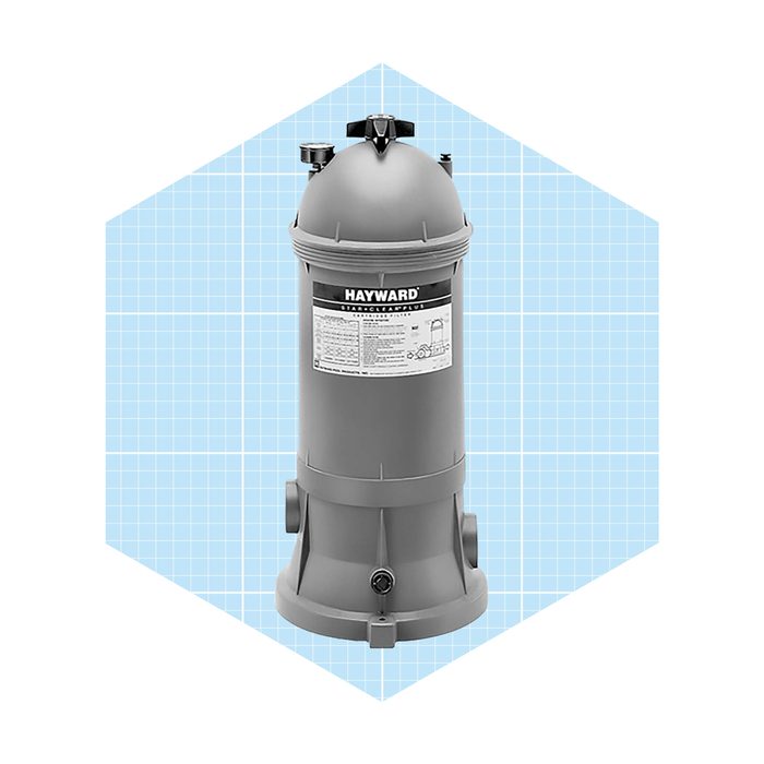 A cylindrical gray filter is positioned upright, featuring a label and various connectors, set against a light blue grid background.