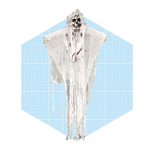 A tattered white ghost figure hangs, resembling a spooky apparition, against a light blue grid background, creating a haunting atmosphere.
