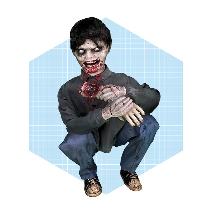 A zombie-like figure squats with a bloody arm, wearing tattered clothes, amidst a light blue grid background, displaying an eerie, monstrous expression.