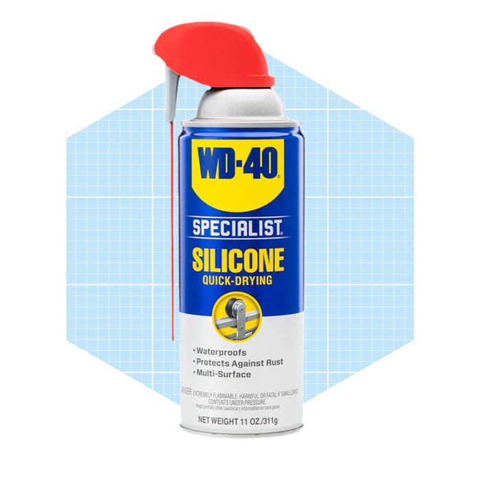 A spray can labeled 