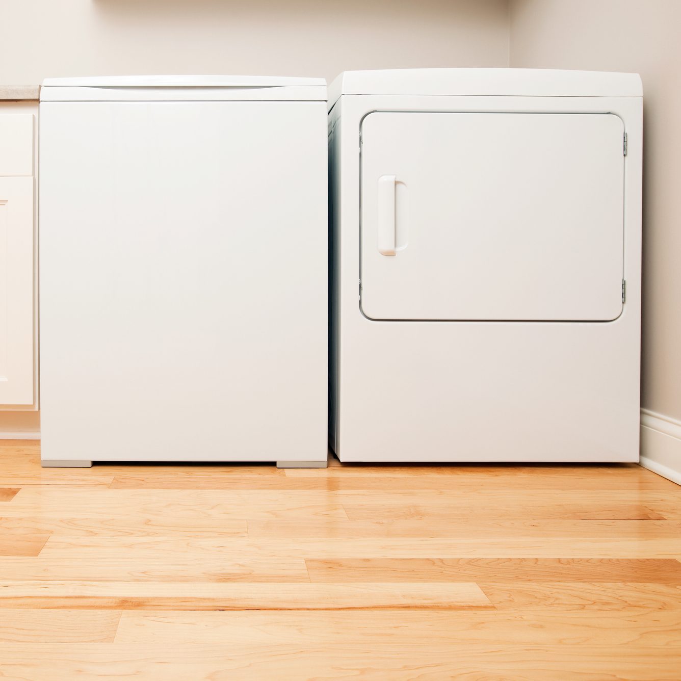 New House Laundry Room with Conventional Washer and Dryer