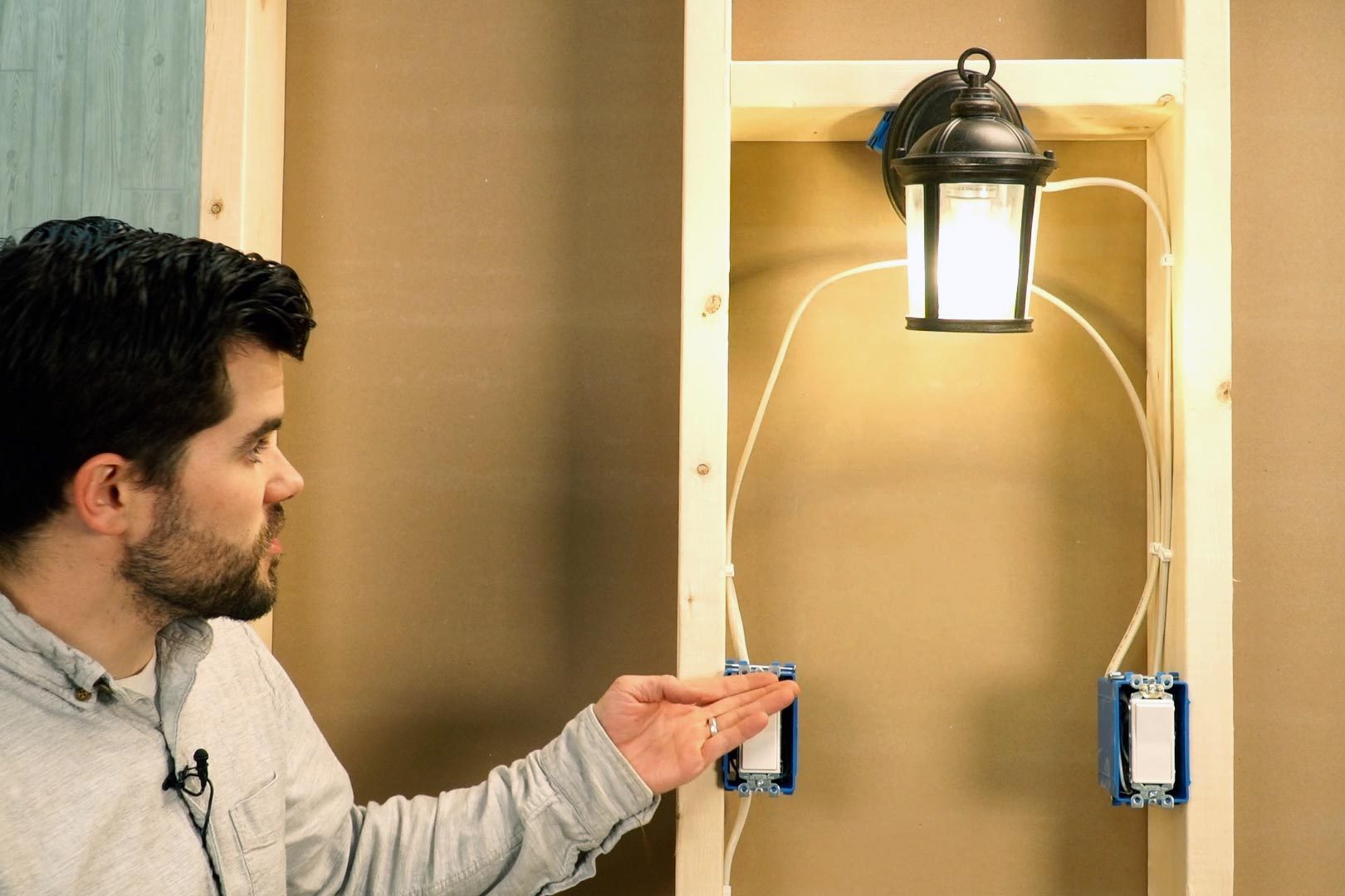 three way switch wired with man turning on light