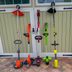 These 8 Top-Rated Grass Trimmers and Weed Wackers Are Perfect for a Well-Kept Lawn